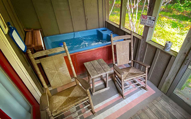 grand gahuti hot tub on the covered porch