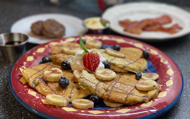 delicious pancakes with fresh fruit on top