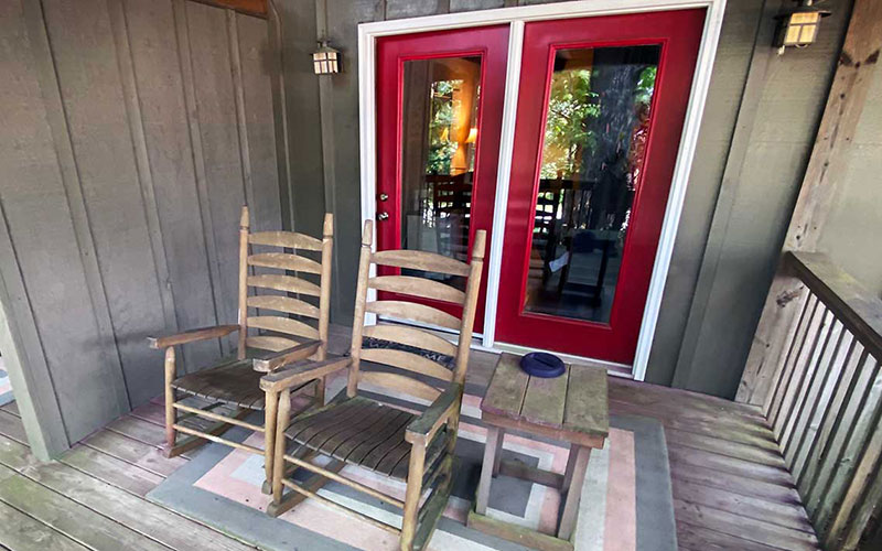 yona den porch with rocking chairs